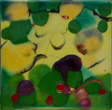 Image of a ceramic canvas with bright greens, purples, yellows, and a bit of red.